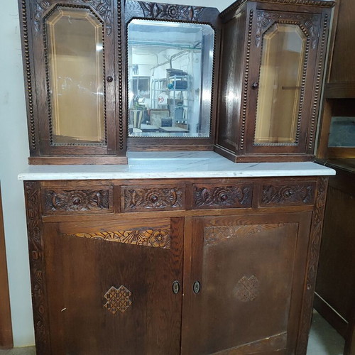 Carved antique buffet used with marble top and mirror