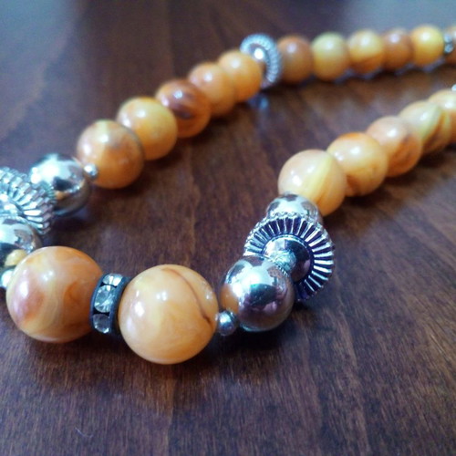 Vintage bakelite necklace used honey color with metal details