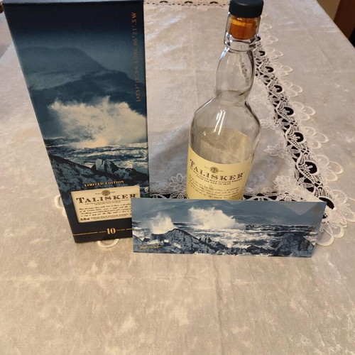 Talisker whiskey collectible empty bottle and Aura water bottle used