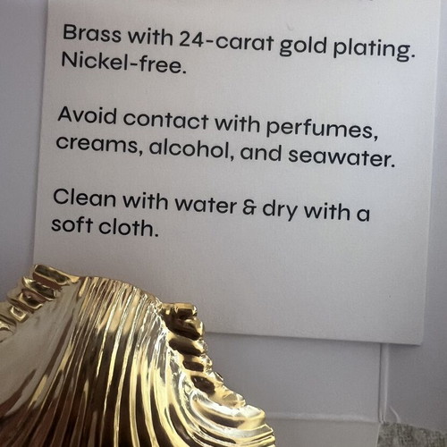 Vassia Kostara gold shell accessory