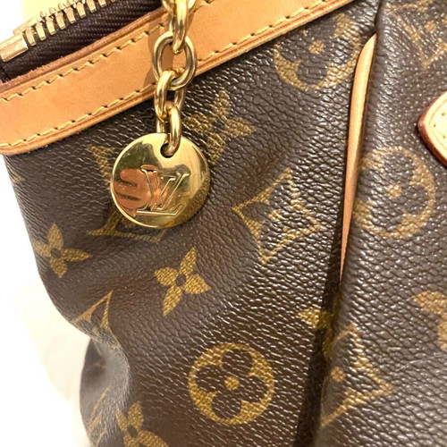 Louis Vuitton Tivoli GM bag like new, large size, adjustable handles
