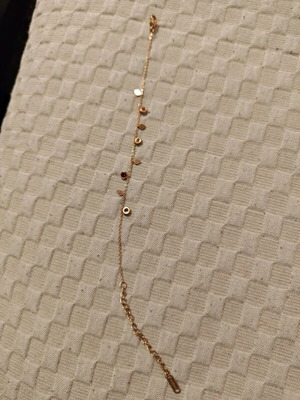 Steel bracelet gold color like new with red and white stones