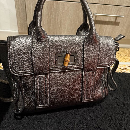 Nora’s silver handbag new with shoulder strap