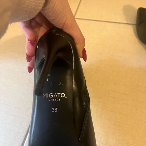 Migato black ankle boots like new with zipper, heel 10 cm, size 38