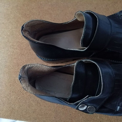 Women's black leather loafers with tassels and snap buttons, size 37