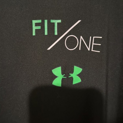 Under Armour athletic shirt like new, size M oversize, black and green