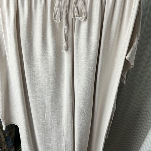 Two women's sets beige and red, like new, airy design