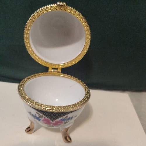 Decorative Faberge-style egg like new with floral motifs