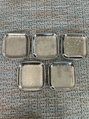 Set of 5 used stainless steel metal coasters from the 70s