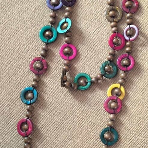 Long necklace like new with wooden beads and colorful accents