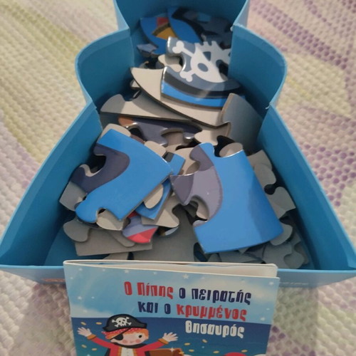 Puzzle 36 pieces new with small book