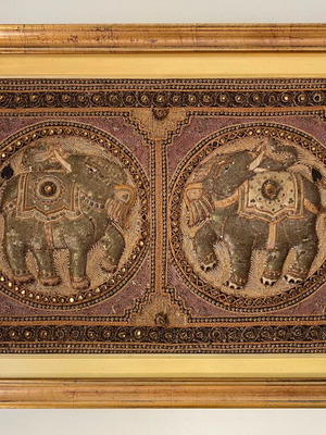 Handmade embossed embroidery with elephants in gold frame used