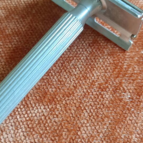 Vintage twist-to-open safety razor used