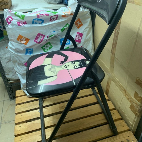 Chair with design used with minor wear