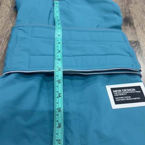 Waterproof dog jacket like new with fleece lining in petrol color