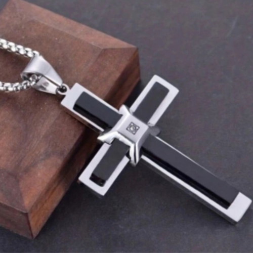 Elegant cross pendant with decorative stone and chain