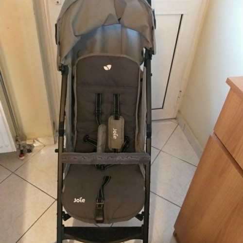 Joie stroller used with waterproof canopy