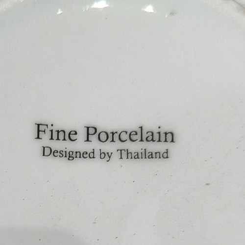 Porcelain tea set with 6 cups and plates
