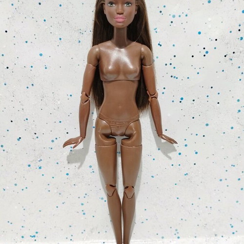 Barbie Made to Move African-American doll used with small flaws
