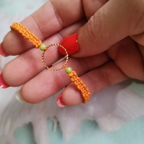 Reflection of the sun bracelet with artificial macrame, beads and metal element, new