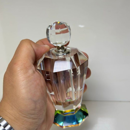 Vintage faceted crystal perfume bottle with iridescent prism base