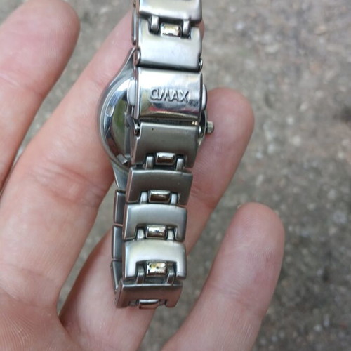 Omax Quartz Model HB 0239 watch like new, silver unisex