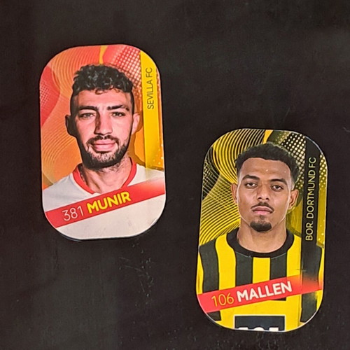 Two metal football cards