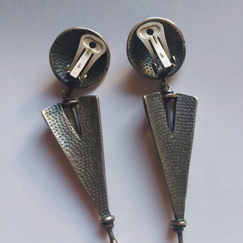 Silver earrings used, large with clips, black and silver