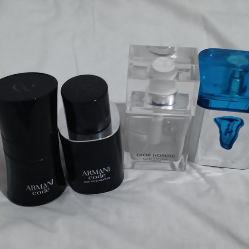 Set of 4 empty bottles from branded perfumes