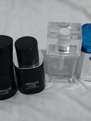 Set of 4 empty bottles from branded perfumes