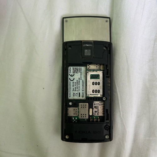 Nokia X3 used phone for parts without battery and back cover