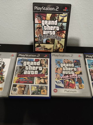 Grand Theft Auto PS2 game bundle with manuals