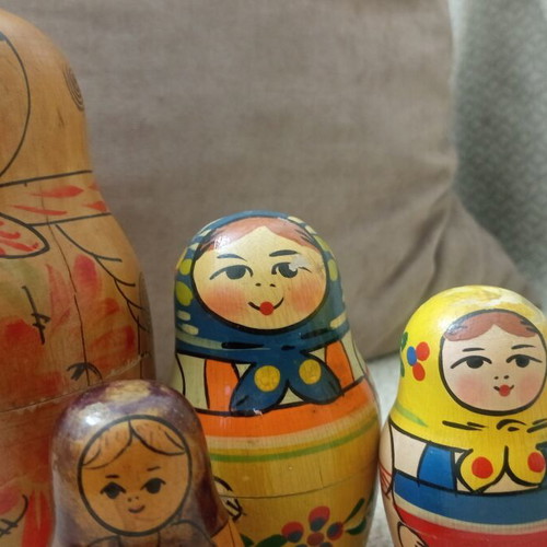 Wooden folk art figures set used, different babushkas