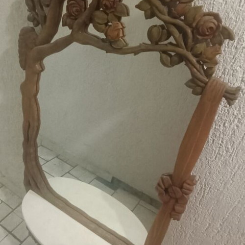 Wooden mirror with carved floral design and marble shelf like new