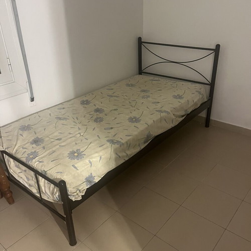 Single metal bed with mattress like new