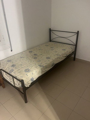 Single metal bed with mattress like new