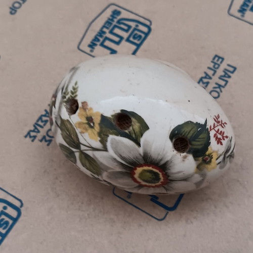 Ceramic incense stick holder egg-shaped used, floral design