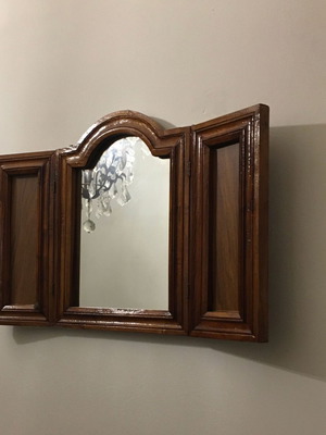 Decorative wall window used with mirrors, wooden panels