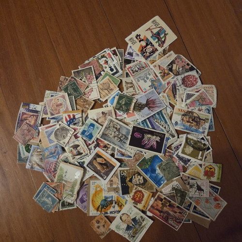 Foreign stamps used, 255 pieces with album and 2 envelopes