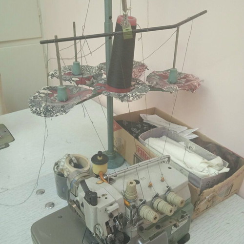 Industrial sewing machines used, including Treasure button machine and cutters