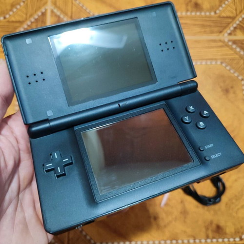 Nintendo DS Lite console with Pokemon Sapphire game used