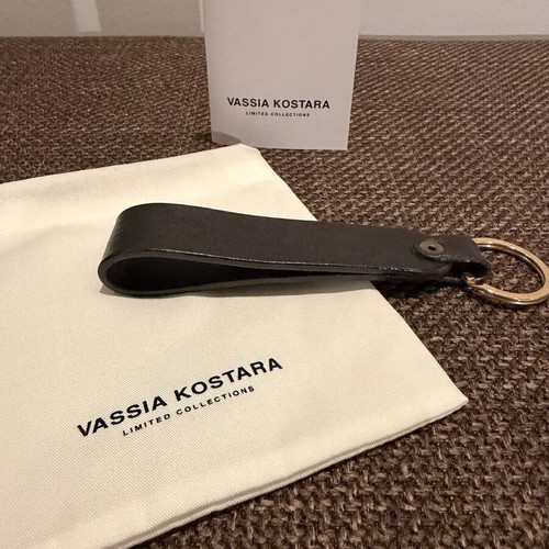 Leather keychain Vassia Kostara Limited Edition like new, black and gold