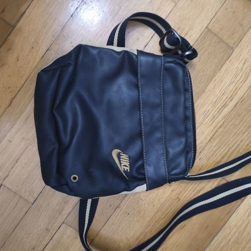 Nike shoulder bag used, black and gold with logo imperfections