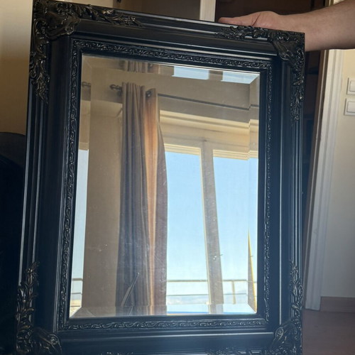 Woodcarved mirror with brass details used
