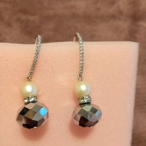 Silver dangling earrings new with pearl, rhinestones and black crystals