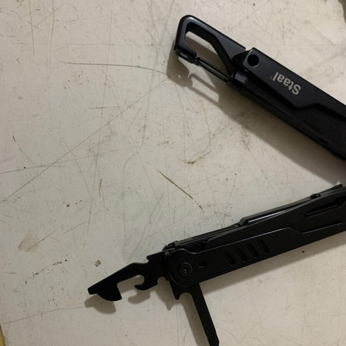 Staal multitool used with case and spare blades