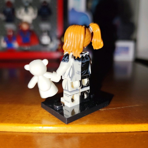 The Little Pale Girl like new with stand and teddy bear