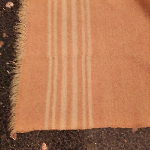 Vintage wool woven rug used in salmon shade