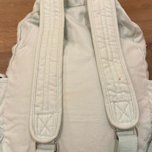 Pink backpack used, fabric turquoise with studs