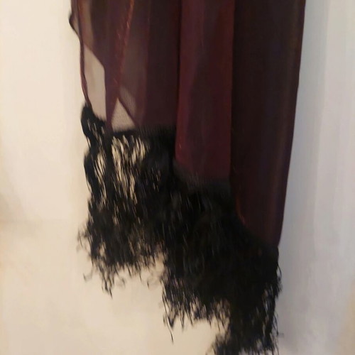 Dark brown scarf used with shimmer and fringes